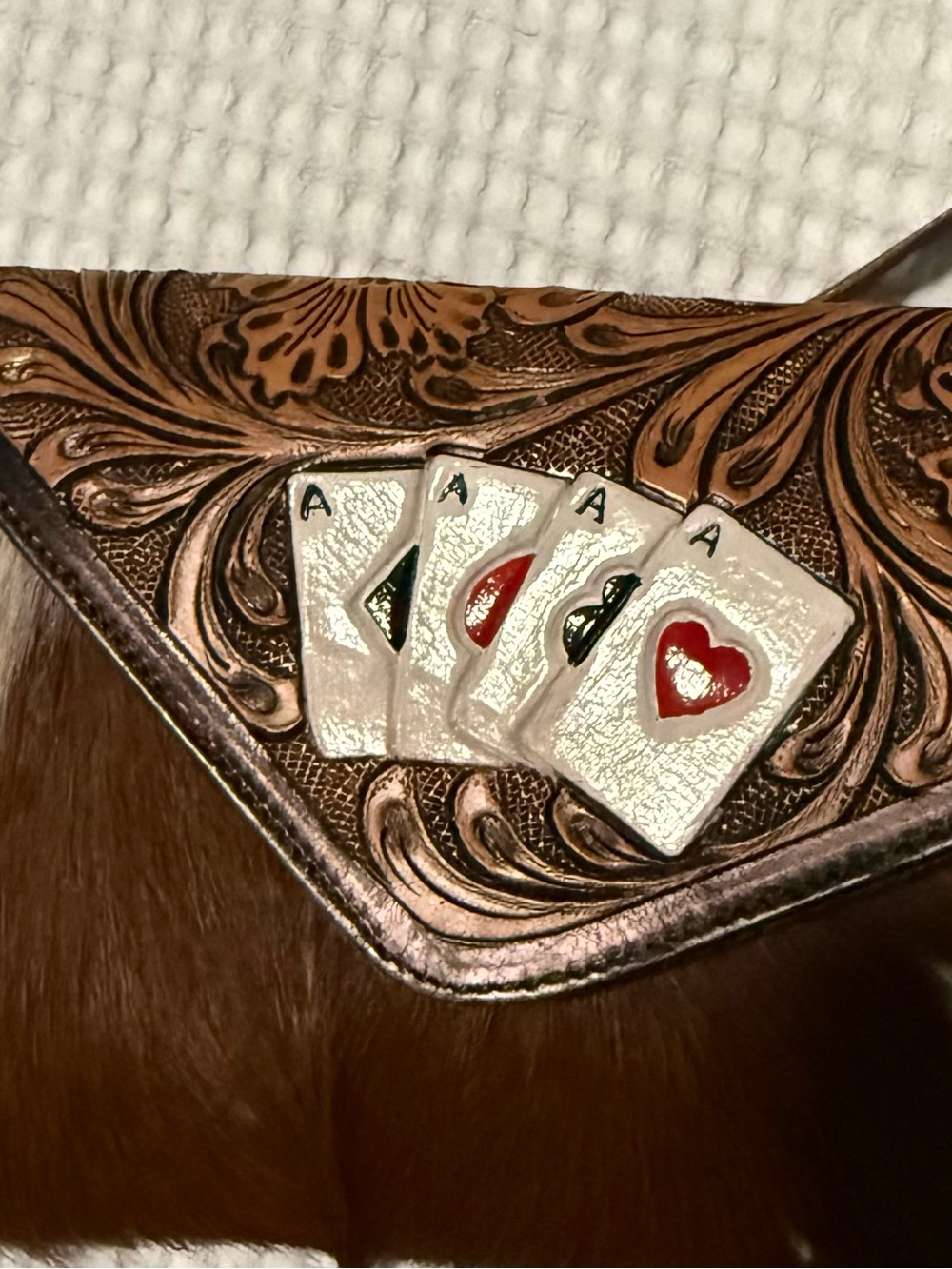 Genuine Leather & Cowhide crossbody or clutch style purse. She’s ready for Vegas